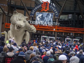 Large crowds line up outside Comerica Park for opening day in downtown Detroit where the Detroit Tigers are hosting the Chicago White Sox to kick off the 2022 season of Major League Baseball, on Friday, April 8, 2022.