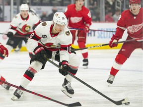 Tim Stüetzle, who had a three-point night for the Ottawa Senators, skates with the puck during the first period against the Detroit Red Wings at Little Caesars Arena.