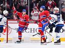 Josh Anderson #17 of the Montreal Canadiens celebrates his goal during the third period against the Winnipeg Jets at the Bell Center April 11, 2022. The Jets defeated the Habs 4-2.