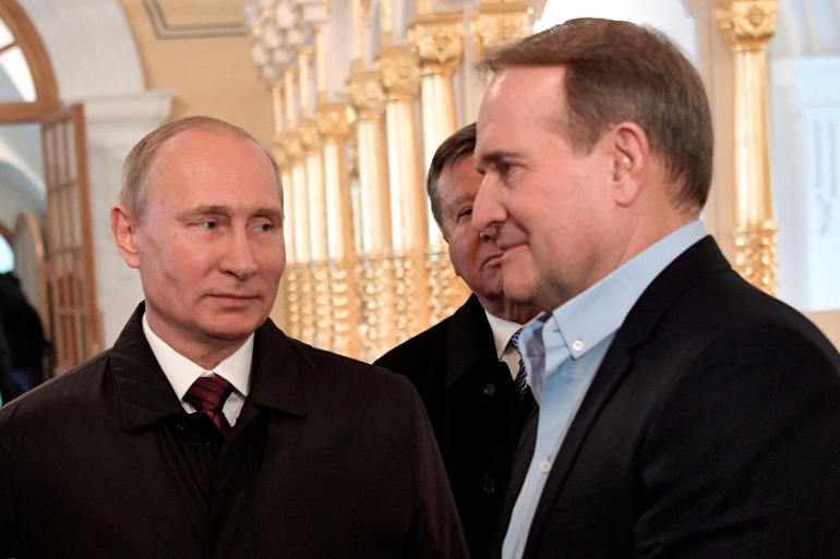 Russian President Vladimir Putin and Ukrainian politician Viktor Medvedchuk