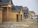 Construction of a single detached home in a new housing development east of Huron Church Line Road, is seen on Tuesday, January 18, 2022. Mayor Drew Dilkens is attending a housing summit in Toronto on Wednesday.
