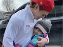 Canadian winger Cole Caufield with eight-year-old fan Kayla Mandarino.