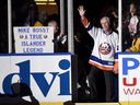 FILE - Hockey Hall of Famer and former New York Islander Mike Bossy waves to fans as he is introduced before the NHL hockey game between the Islanders and the Boston Bruins at Nassau Coliseum on Thursday, Jan. 29, 2015, in Uniondale, NY Bossy dropped a ceremonial first puck. 