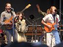 Arcade Fire — Win Butler, Regine Chassagne, William Butler and Richard Reed Parry — give a surprise free show in a Longueuil parking lot in 2010.
