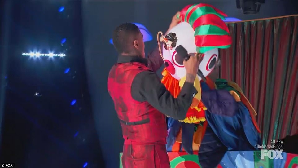 Host Nick Cannon unmasks Rudy Giuliani on Wednesday night's episode of The Masked Singer