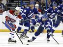 Montreal Canadiens center Jonathan Drouin (92) skates around Tampa Bay Lightning center Steven Stamkos (91) during the second period of an NHL hockey game Saturday, March 10, 2018, in Tampa, Fla.