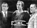 Three eras of the Montreal Canadiens at the Forum in Montreal on April 12, 1979. Guy Lafleur is flanked by Jean Beliveau, left, and Maurice (Rocket) Richard.