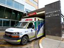 An ambulance sits stationary at the Foothills Medical Center as the Alberta government launched a provincial emergency medical services advisory committee to address the situation in Calgary on Monday, January 24, 2022. 