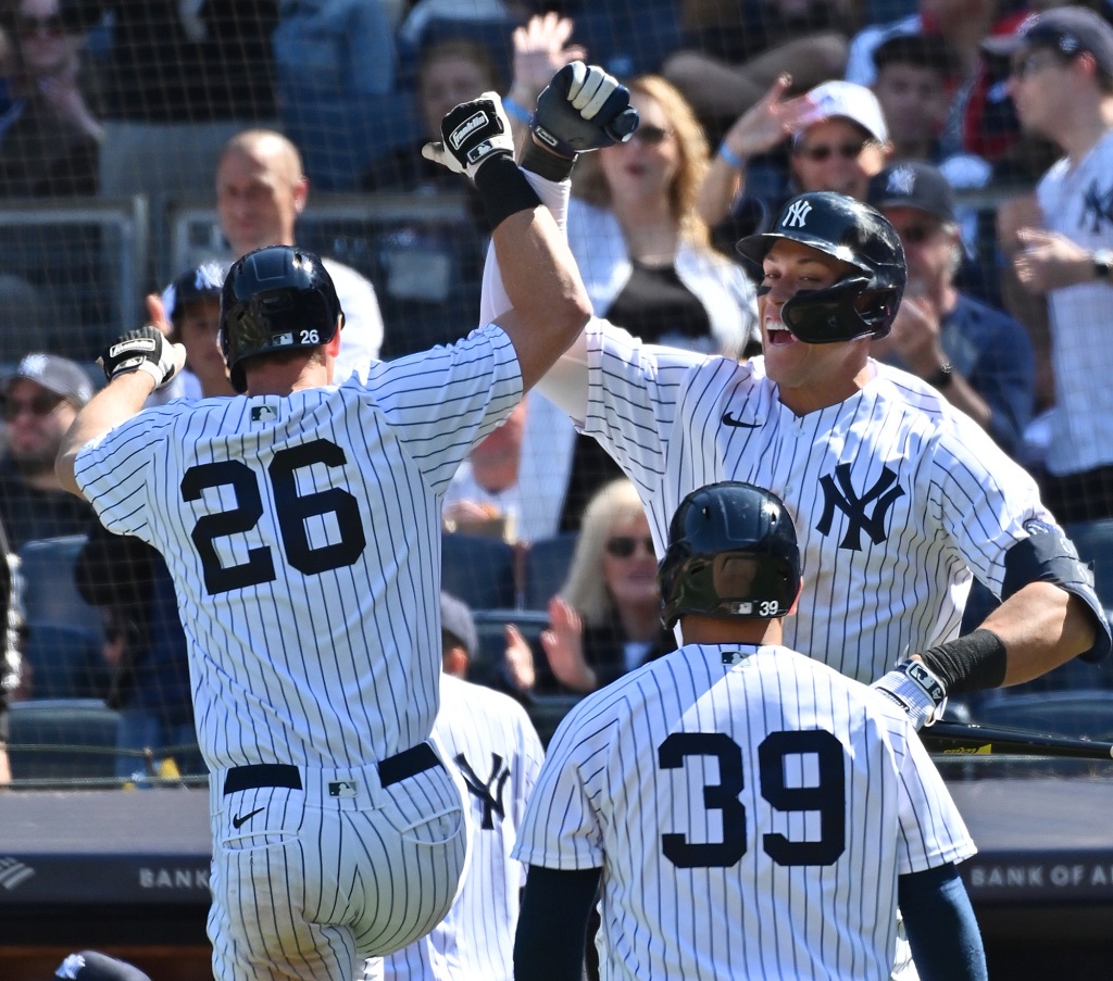 DJ LeMahieu (26) celebrates his two-run home run with Aaron Judge (99) during the Yankees' victory over the Guardians on Sunday.