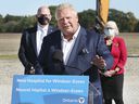 Ontario Premier Doug Ford speaks at a press conference on Monday, October 18, 2021 in Windsor at the site of the proposed mega-hospital as Windsor Mayor Drew Dilkens and Janice Kaffer, president and CEO of Hotel-Dieu Grace Healthcare look on.