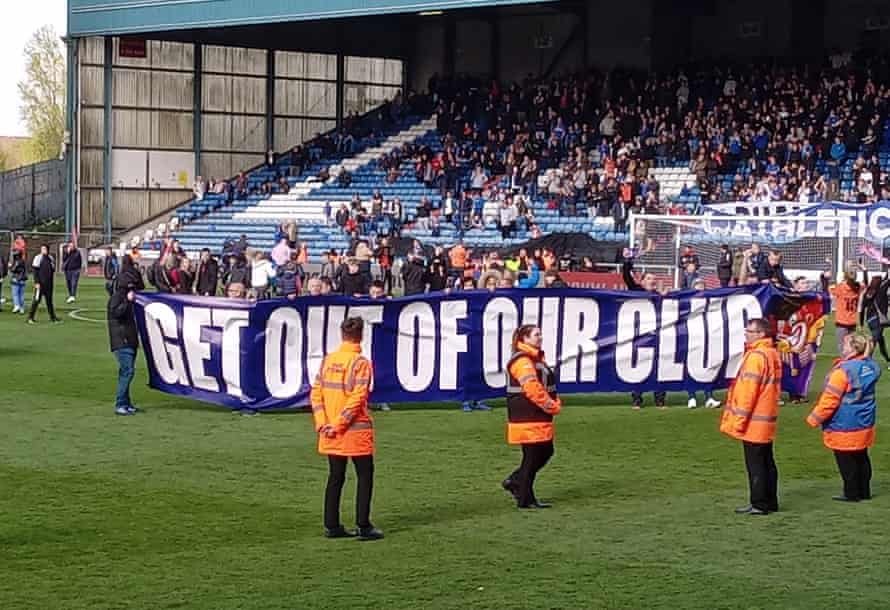 Oldham fans with a message for their owners.