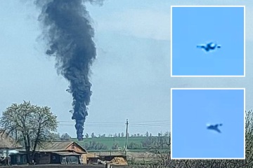 'Russian' jet spirals to earth in flat spin and explodes after 'missile hit'
