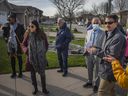 Barry Horrobin, right, director of planning and physical resources with the Windsor Police Service, leads a group of interested parties on a walkabout assessment in the area of ​​Northwood Public School, on Wednesday, April 20, 2022.