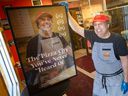 Bob Abumeeiz, owner of Arcata Pizzeria in Windsor, shows off the movie poster for The Pizza City You've Never Heard Of - a documentary about Windsor-style pizza that includes Arcata pies.  Photographed Nov. 23, 2021.