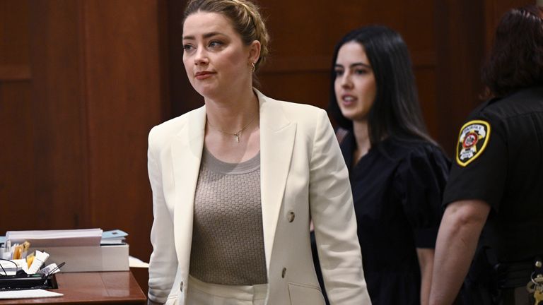 Actress Amber Heard arrives in court for her libel trial at the Fairfax County Circuit Court in Fairfax, Virginia on April 26, 2022. - Actor Johnny Depp sued his ex-wife Heard for defamation after she wrote an opinion piece in The Washington Post in 2018 referring to herself as a public figure representing domestic abuse... (Photo by Brendan SMIALOWSKI / POOL / AFP) PHOTO: AP
