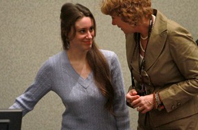 Casey Anthony (left) enters the courtroom with her attorney Dorothy Clay Sims for her sentencing hearing on charges of lying to a law enforcement officer at the Orange County Courthouse on July 7, 2011 in Orlando, Fla. Anthony was acquitted of murder charges on July 5, 2011, but will serve four, one-year sentences on her conviction of lying to a law enforcement officer.