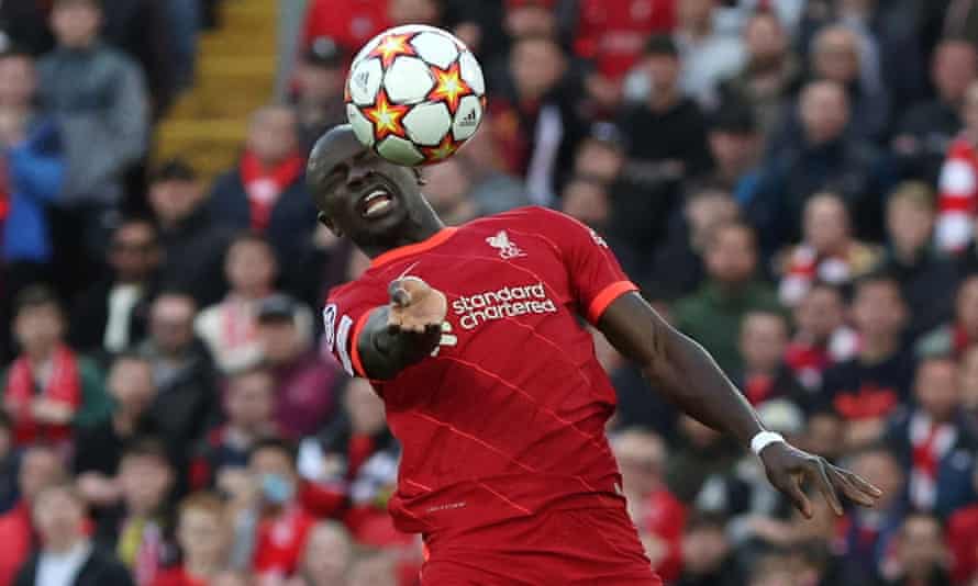 Liverpool's Sadio Mane manages to get his head into the ball but is unable to direct it on goal.