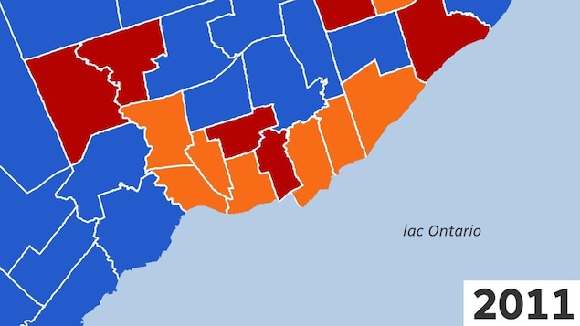 The map of the federal ridings of Greater Toronto, in 2011. Blue dominates, followed by orange and red.