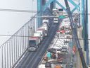 Trucks are shown on the Ambassador Bridge on Monday, February 14, 2022.