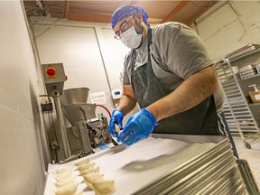 Rob Myers, co-owner of Little Foot Foods, prepares perogies at their Tecumseh Road East location, on Tuesday, April 26, 2022. The business is expanding into a 5,000 square foot facility in Oldcastle.