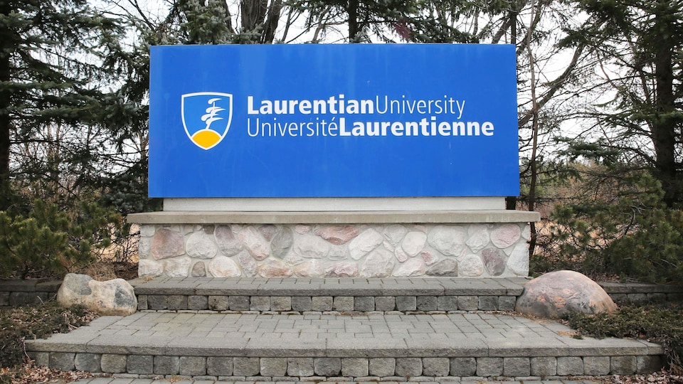 A billboard with the Laurentian University logo