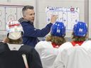 Montreal Canadiens head coach Martin St. Louis talks strategy during practice at the Bell Sports Complex in Brossard on April 25, 2022.