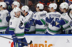 The Vancouver Canucks celebrate a goal by forward JT Miller (9) during the first period against the Edmonton Oilers at Rogers Place.
