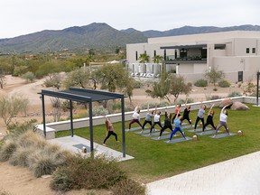 The yoga lawn with the Frank Lloyd-Wright inspired spa building in the background.  Wildlife abounds in the area, including bobcats, rabbits, hawks and hummingbirds.  CREDIT: Civana Wellness Resort & Spa