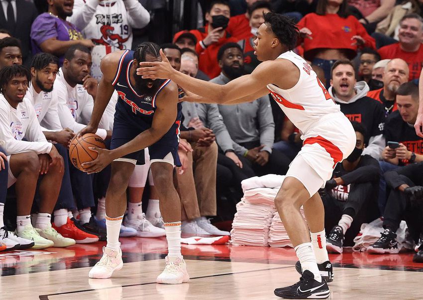 Raptor Scottie Barnes hinders James Harden's next move in Saturday's Game 4 win over the 76ers at Scotiabank Arena.
