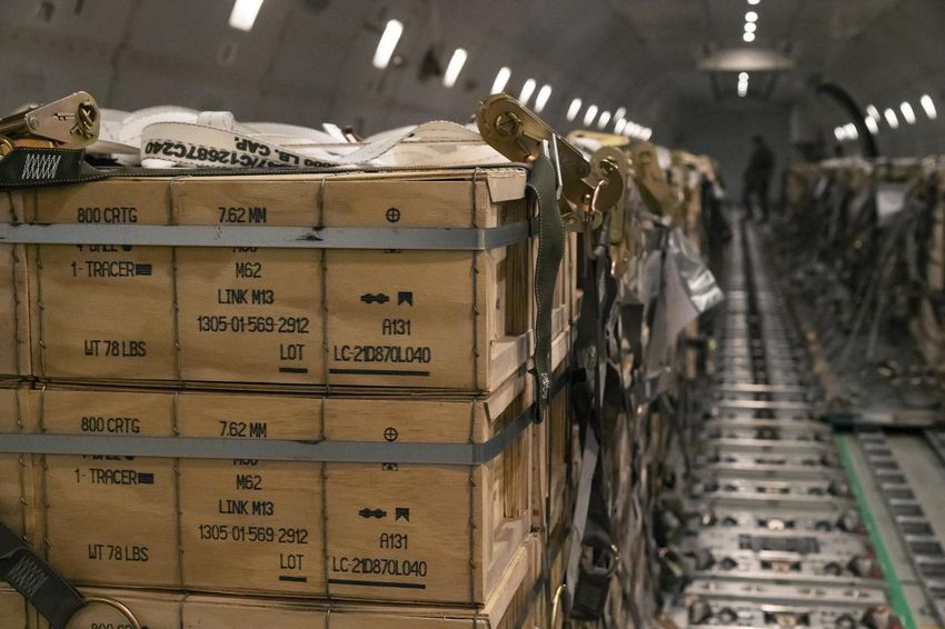 In this image provided by the US Air Force, pallets of ammunition, weapons and other equipment bound for Ukraine are loaded on a plane by members from the 436th Aerial Port Squadron during a foreign military sales mission at Dover Air Force Base, Del., on Jan. 30.