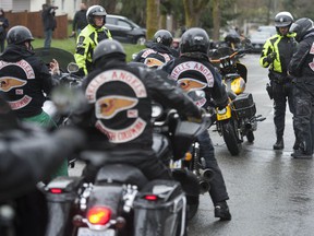 Police monitor the annual Hell's Angels' Screwy Ride in Vancouver in 2019. A BC member of the Nomad's club, who recently was at the 2022 version of the ride, has been arrested and the US is seeking his extradition.