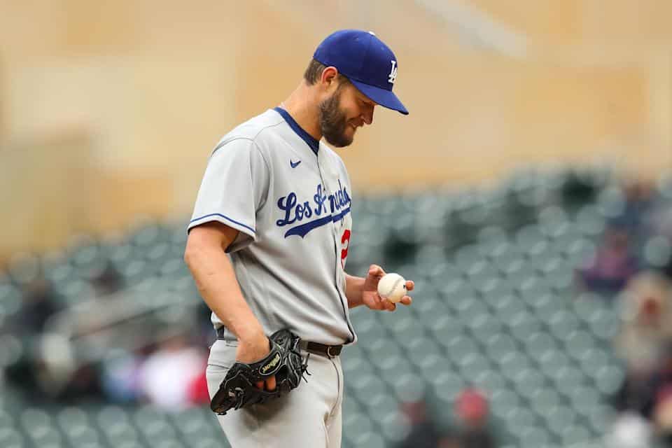 MINNEAPOLIS, MN - APRIL 13: Clayton Kershaw #22 of the Los Angeles Dodgers prepares to throw against the Minnesota Twins in the sixth inning of the game at Target Field on April 13, 2022 in Minneapolis, Minnesota.  The Twins defeated the Dodgers 7-0.  (Photo by David Berding/Getty Images)