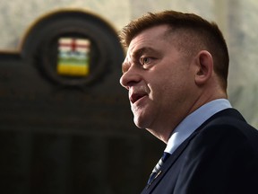 Brian Jean speaks to the media after being sworn in as an MLA on Thursday, April 7, 2022, at the Alberta legislature in Edmonton.