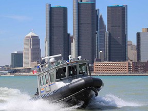 A Royal Canadian Mounted Police Titan Boat on the Detroit River at Windsor, Ontario.