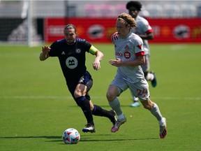 CF Montreal midfielder Samuel Piette controls ball ahead of Toronto FC forward Jacob Shaffelburg during the second half at DRV PNK Stadium on April 17, 2021, in Fort Lauderdale, Fla.