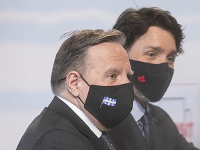 Prime Minister Justin Trudeau with Premier François Legault at a March 15, 2021 press conference.
