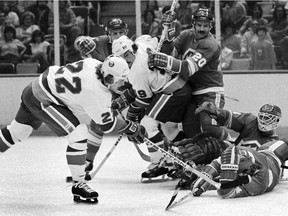 New York Islanders' Mike Bossy, 22, scores against the Atlanta Flames at the Nassau Coliseum in Uniondale, NY, on Sept.  27, 1979.