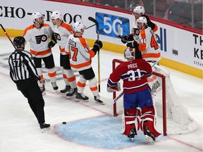 The Flyers celebrate James van Riemsdyk's first-period goal against Canadiens goaltender Carey Price Thursday night at the Bell Centre.