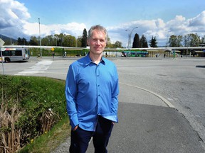 Alex Boston, executive director of SFU's Renewable Cities program, says a major missed opportunity in the region is underutilized publicly owned rapid transit stations and bus exchanges, like Phibbs Exchange in North Vancouver on April 28.
