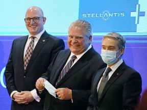Windsor Mayor Drew Dilkens, left, Ontario Premier Doug Ford and Federal Minister of Economic Development, Job Creation and Trade François-Philippe Champagne are shown at a press conference on Wednesday, March 23, 2022 in Windsor where a -billion dollar investment to build an EV battery plant in the city was announced.