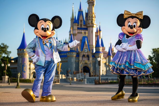 Iconic Disney characters Mickey Mouse and Minnie Mouse photographed during the Walt Disney World Resort 50th Anniversary Celebration in Lake Buena Vista, Florida. "don't say gay" law.  (Matt Stroshane, photographer)