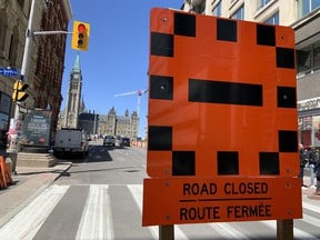Road closed signs were posted near Parliament Hill on Thursday ahead of the expected arrival of the Rolling Thunder motorcycle convoy.