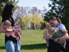 Staci Pinkerton (left) with twins Lillian and Sienna and Danielle Friest (right) with twins Jack and Charlotte.  Both women are part of Fertility Friends, a peer support group for women struggling with infertility?  and who gathered with other women on Saturday, April 23, 2022 to celebrate their ?miracle babies.