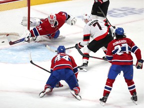 The Ottawa Senators' Brady Tkachuk scores a goal against Montreal Canadiens goaltender Jake Allen during the second period at the Bell Center on Tuesday night.