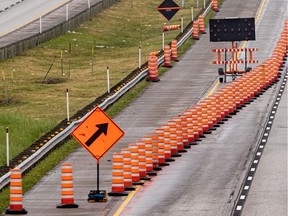 Construction cones line to highway.