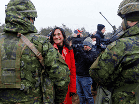 Defense Minister Anita Anand during a March 8 visit to Canadian soldiers serving in Latvia.  Shortly after her return, Anand announced that she would present 