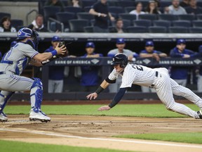Yankees' Josh Donaldson attempts to score a run in the first inning against the Blue Jays at Yankee Stadium in New York.