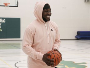 Jesse Luketa plays some basketball at his old high school, St Pat's in Ottawa.