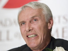 Canada's Sports Hall of Fame inductee and former hockey great Mike Bossy, during a news conference in Toronto, Thursday Oct. 25, 2007. Bossy, one of the most prolific goal-scorers and a star for the New York Islanders during their 1980s dynasty, died Friday, April 15, 2022, after a battle with lung cancer.  He was 65.