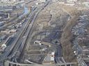 This April 2015 photo shows the Turcot Interchange construction site and the falaise St-Jacques at right. 